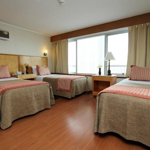 RQ Santiago in Santiago, image may contain: Bed, Furniture, Bedroom, Flooring