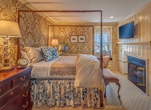 Golden Plough Inn at Peddler's Village in Lahaska, image may contain: Furniture, Bedroom, Indoors, Bed