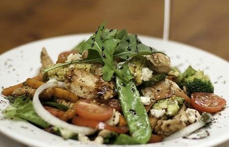 Cajun Chicken salad with Stirfry Veg, Cashew Nuts and Blue Cheese Crumbs on Crisp Lettuce