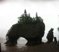 Praia Da Maré Baixa Na Baía De Fundy Novo Brunswick - a água De Cor  Castanha De Canadá Chamou O Rio Do Chocolate Foto de Stock - Imagem de  liso, dinâmico: 101530346