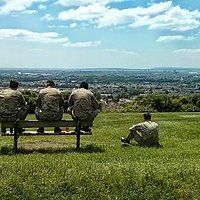 Squaddies enjoying a Mick Monster burger and the view.