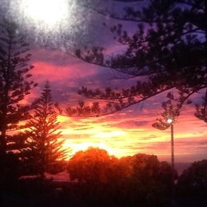 our bedroom window view. beautiful sunrise. there are 3 dorms with a ocean view and a possibilit
