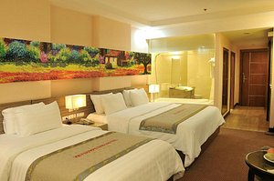 Vietsovpetro Hotel in Da Lat, image may contain: Hotel, Resort, Bed, Furniture