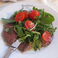 tagliata pomodorini e rucola