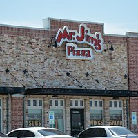 Sign over Mr. Jim's Pizza Entrance