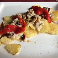 Il lomo con patate e peperoni