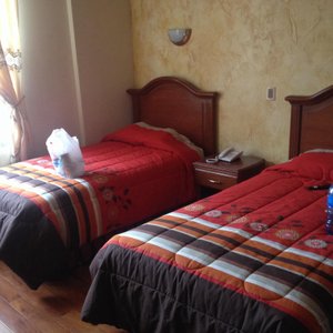 Golden Palace in La Paz, image may contain: Furniture, Bed, Bedroom, Room