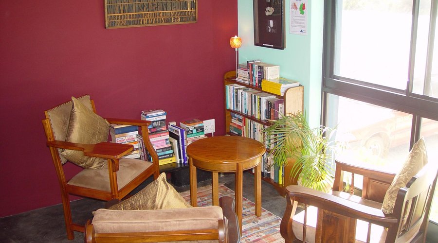 A cosy reading corner with a view of the mountains