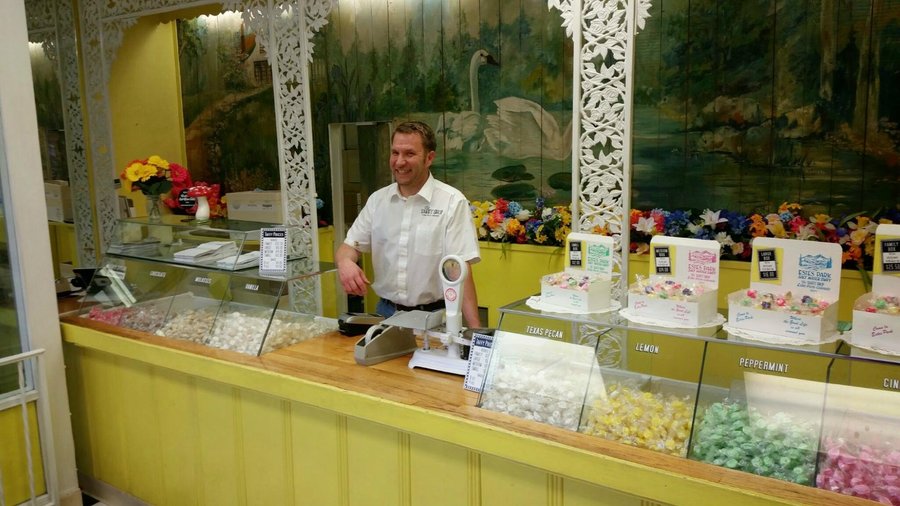 The Taffy Shop owner behind the counter