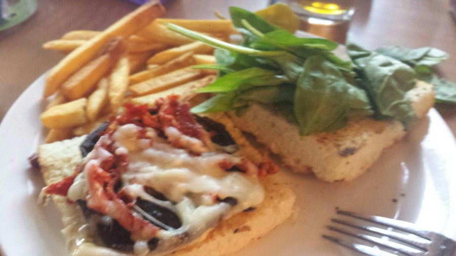 Very sad portobello sandwich  :-(  lots of bread, very little mushroom and very dry.  The servic