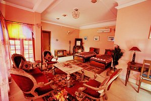 The Ummaid Bagh Resort in Bundi, image may contain: Living Room, Furniture, Home Decor, Couch