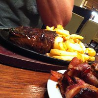 Delicious steak, bacon and fries