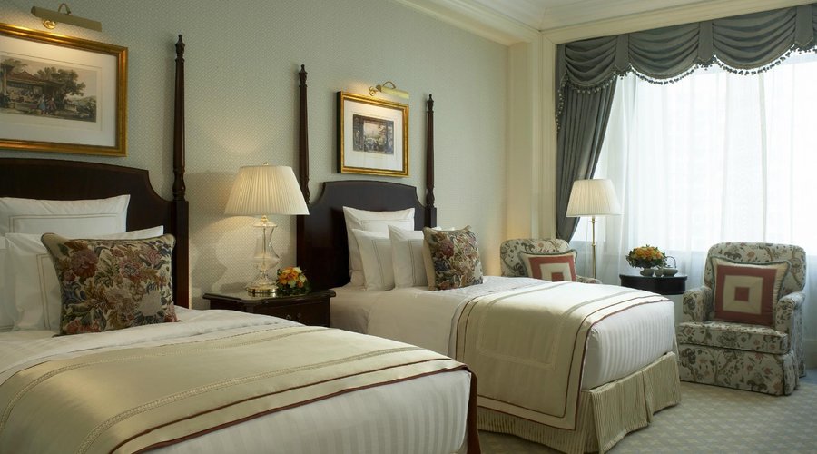Deluxe Room (48sqm/516sqft) with a spacious room layout.