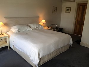 Oscars Waterfront Boutique Hotel in Port Fairy, image may contain: Furniture, Bed, Bedroom, Painting