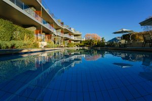 Lakeside Apartments in Wanaka, image may contain: Hotel, Resort, Pool, Water