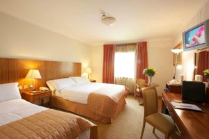 Broadhaven Bay Hotel in Belmullet, image may contain: Monitor, Screen, Dorm Room, Chair