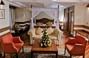 Silver Springs Hotel in Nairobi, image may contain: Couch, Furniture, Living Room, Indoors