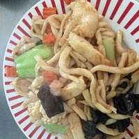 Stir fried seafood with handmade noodle