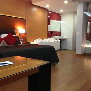 Portofino Motel in Matosinhos, image may contain: Bed, Furniture, Bedroom, Interior Design