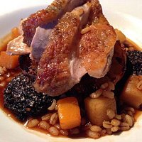 honey roast game fowl with potato rosti, cabbage and black pudding