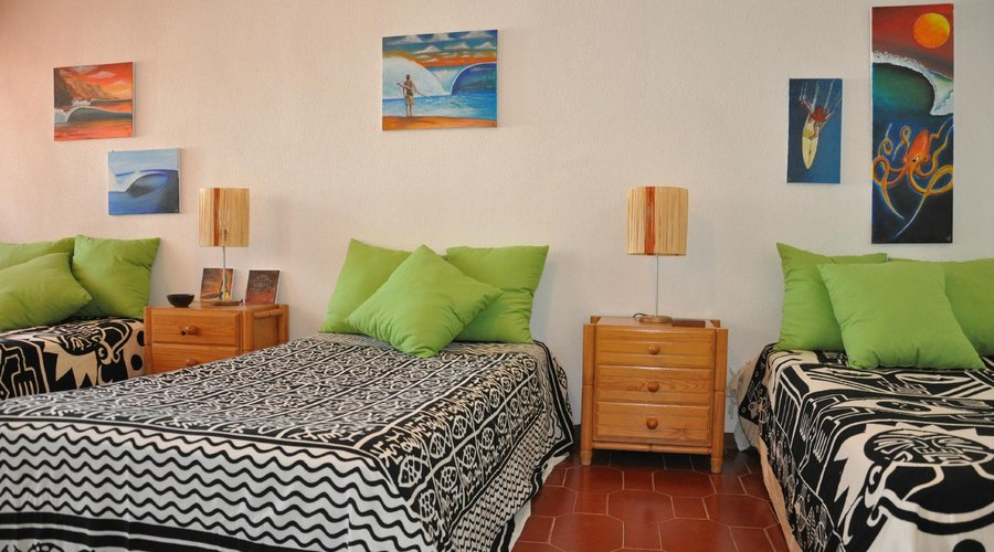 The family studio,with three single beds plus one couple queen bed 
