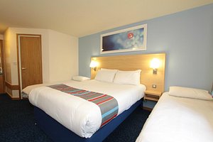Travelodge Gateshead in Swalwell, image may contain: Bed, Furniture, Corner, Dorm Room