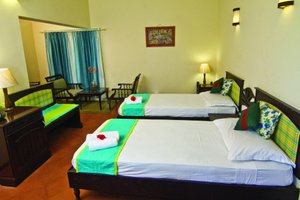 Blooming Bay - Clifftop Beach Resort in Varkala Town, image may contain: Bed, Furniture, Hotel, Chair