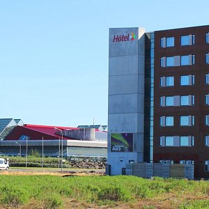 Aurora Hotel in Keflavik, image may contain: Office Building, City, Urban, Hotel