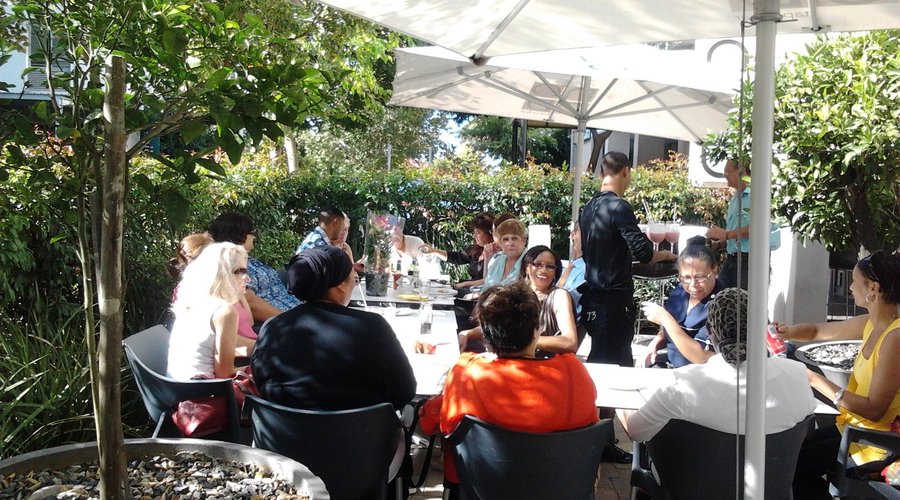 Customers enjoying Cafè Nood's relaxed ambiance