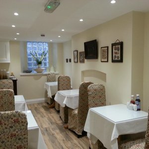 The dining area for breakfast is located in the basement.