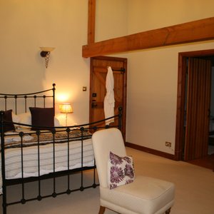 The comfortable bed in room 1