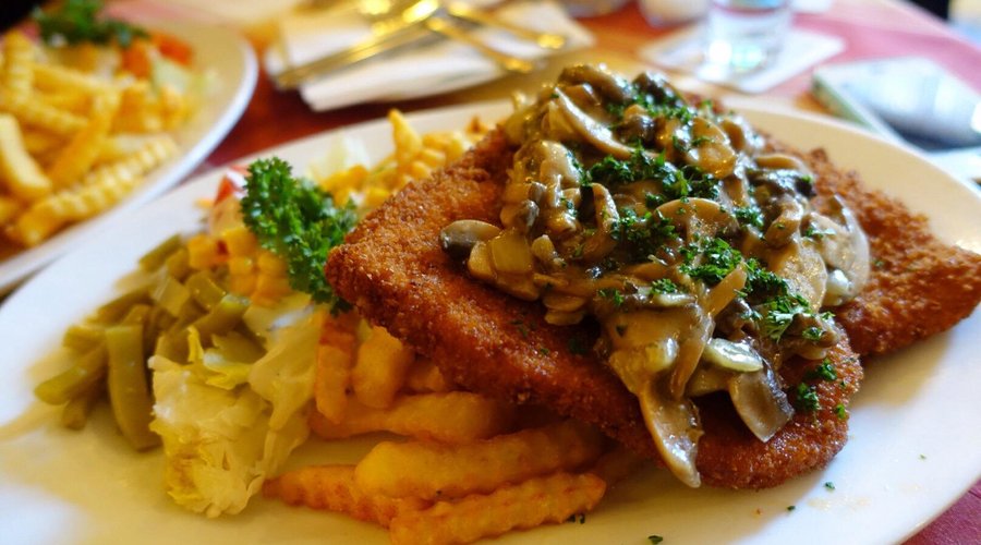 Wiener schnitzel with mushroom sauce