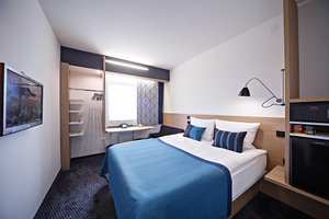 BonHotel in Minsk, image may contain: Monitor, Screen, Furniture, Indoors
