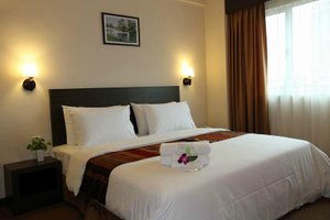 Hotel Summer View in Kuala Lumpur, image may contain: Cushion, Home Decor, Plant, Bed