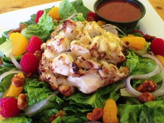 Raspberry Walnut Salad topped with our Crab Cake!