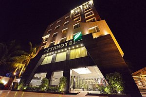 Ethnotel in Kolkata (Calcutta), image may contain: Hotel, Lighting, Night, Condo