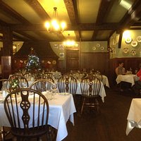 Cosy interior based on an English pub style.