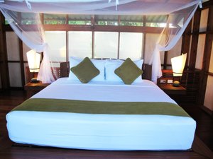 Jicaro Island Lodge Granada in Isletas de Granada, image may contain: Furniture, Bed, Bedroom, Indoors