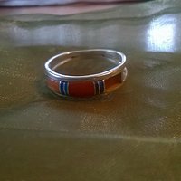 A ring bought by Sorella Gallery where a stone fel out in only one day.
