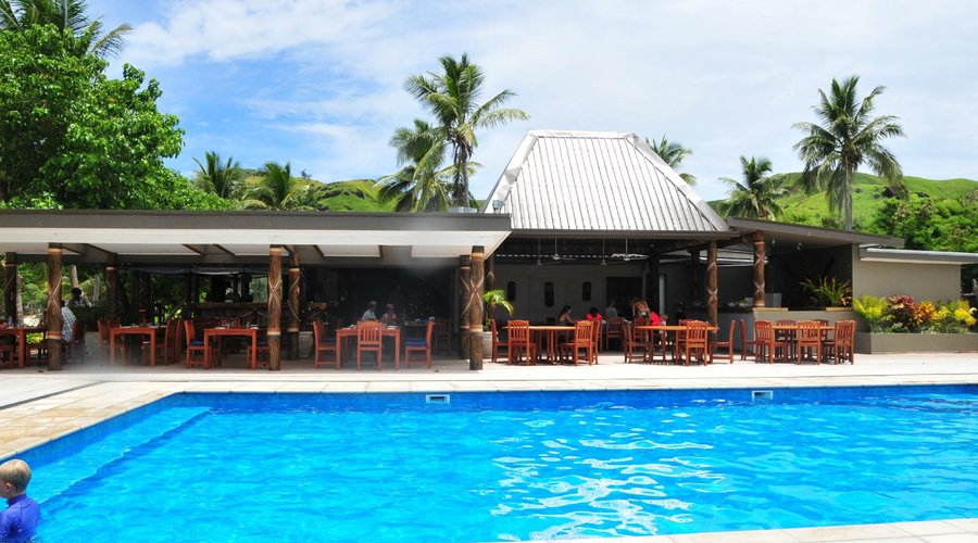 Lovely outdoor dining around pool
