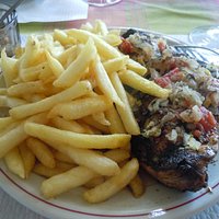 the best poulet boucane (smoked chicken) we had in martinique - with piment confit and fries