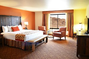 Hoover Dam Lodge in Boulder City, image may contain: Furniture, Chair, Home Decor, Bedroom