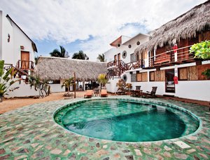Hotel Budamar Zipolite in Zipolite, image may contain: Villa, Hotel, Resort, Chair