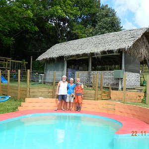 Myself with Allan & Maggie: meals hut and new heart-shaped pool.