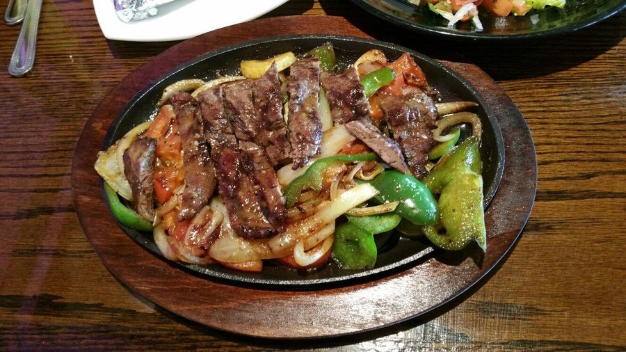 The fajitas were amazing. One of the best dishes to get. Had it with a lime margarita this mad m