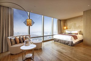 Lotte Hotel Hanoi in Hanoi, image may contain: Penthouse, Building, Balcony, Bed