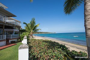 Villa Tropical Oceanfront Apartments on Shacks Beach in Puerto Rico, image may contain: Villa, Balcony, Hotel, Resort