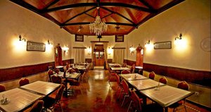 Prospect Hotel in Panchgani, image may contain: Restaurant, Dining Room, Dining Table, Cafe