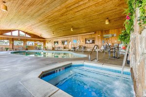 Misty Harbor Resort in Wells, image may contain: Interior Design, Hot Tub, Tub, Resort