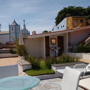 Solar Das Artes Pousada Boutique - Morro in Ilha de Tinhare, image may contain: Home Decor, Bed, Furniture, Cushion